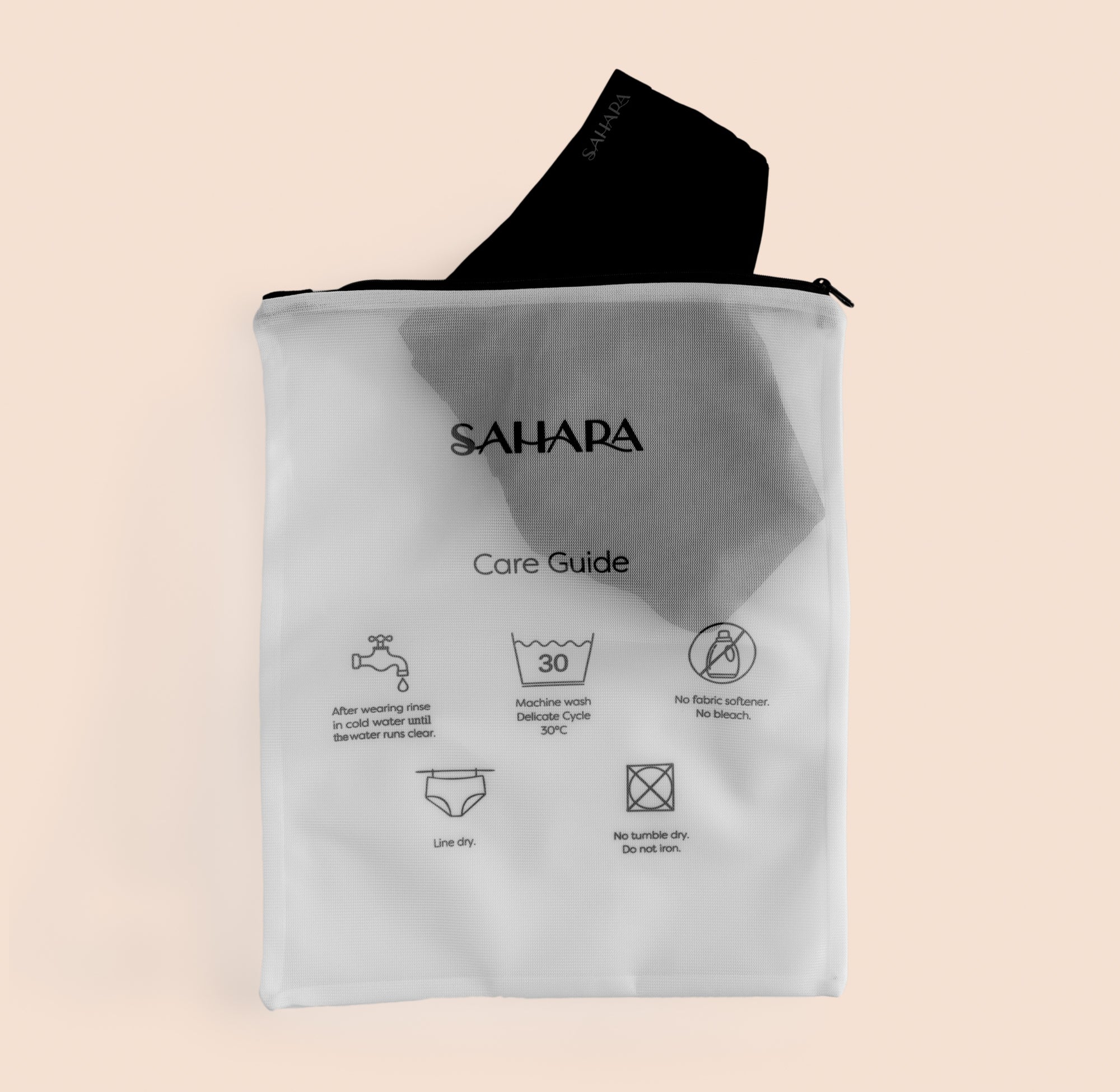 White delicates wash bag. Care guide printed on the front. Wash bag to help protect your Sahara underwear and swimwear.