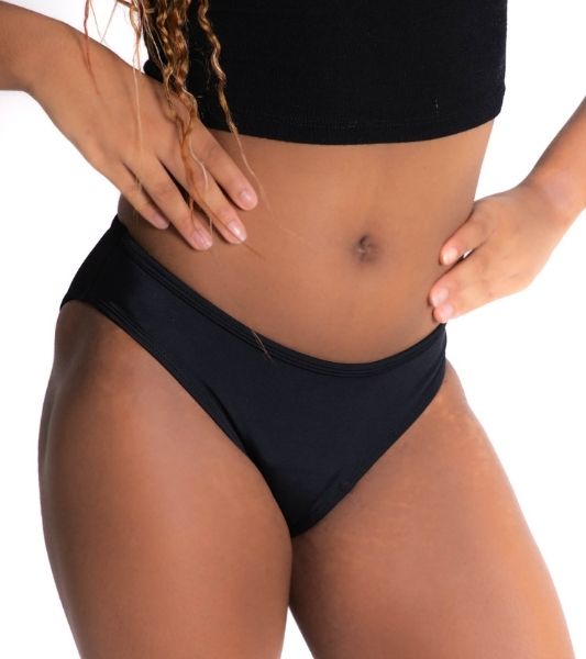 Teen wearing Sahara black period swimmers. Front view. 