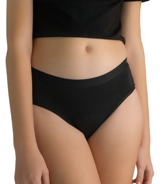 Teen wearing black boyleg period pants - comfortable fit